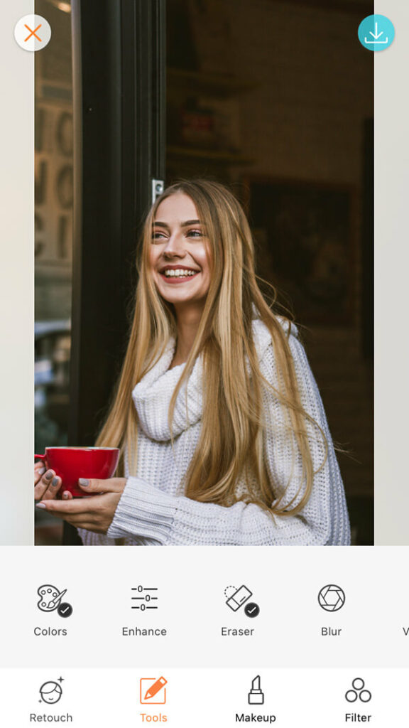 A picture of a blonde woman being edited by AirBrush 