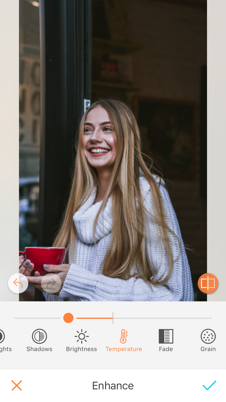 A picture of a blonde woman being edited with the Temperature, by AirBrush 