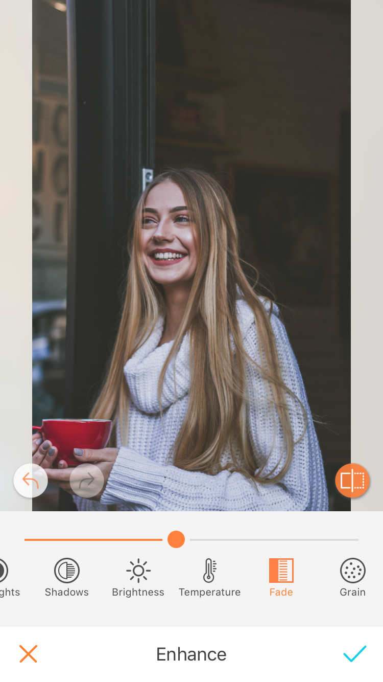 A picture of a blonde woman being edited with the Fade, by AirBrush 