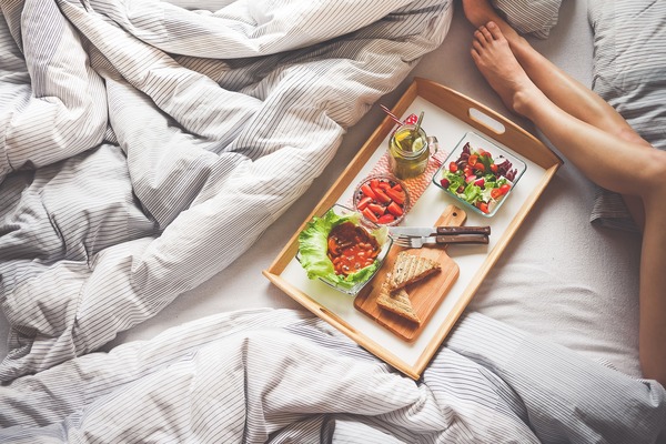 overhead shot of breakfast in bed