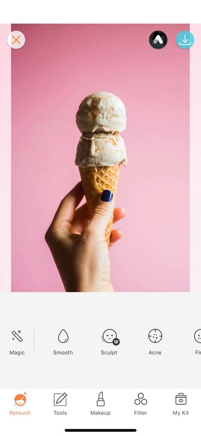 ice cream cone against a pink background