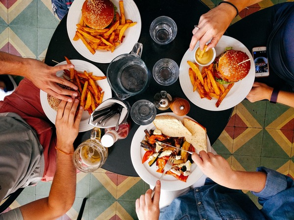 overhead shot of burgers and fries