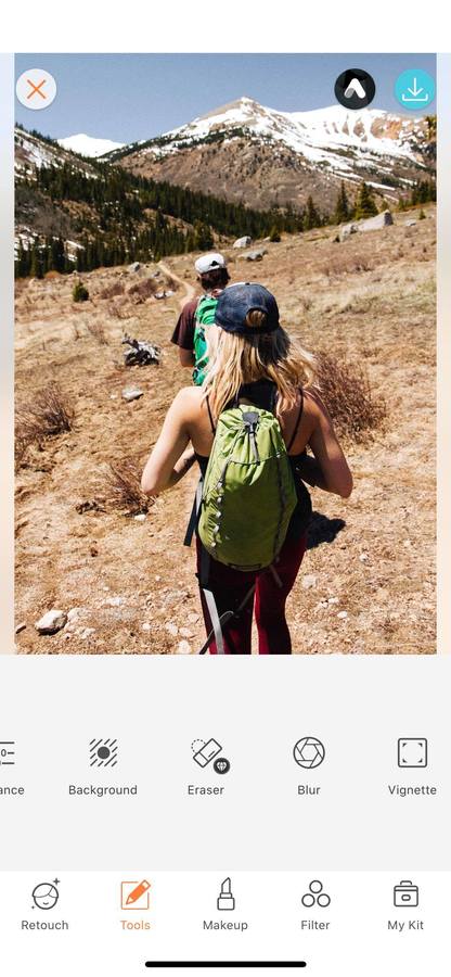two people hiking in the hills