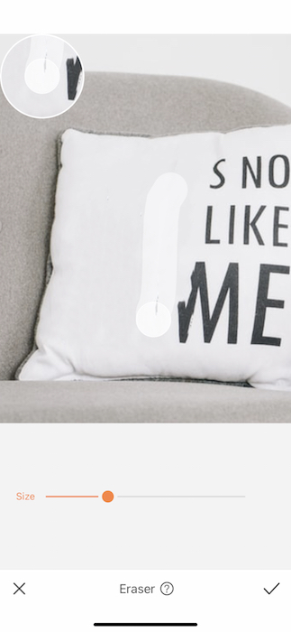 Closeup of white pillow with black writing