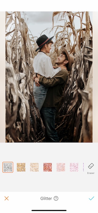 smiling couple embracing in a corn field