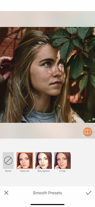 Picture of a blonde girl with plants in her eyes being edited by AirBrush