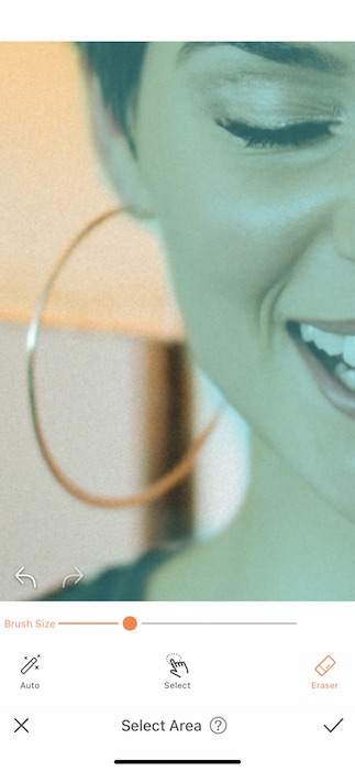 closeup of woman wearing large hoop earring