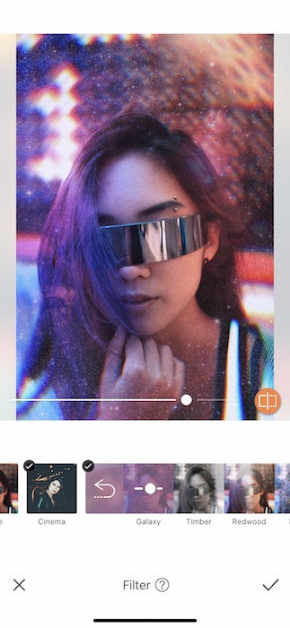 Picture of a woman with intergalactic glasses being edited by AirBrush with Filter