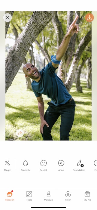 a black man pointing to the sky