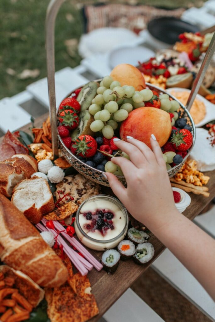 picnic feast with fruits and breads