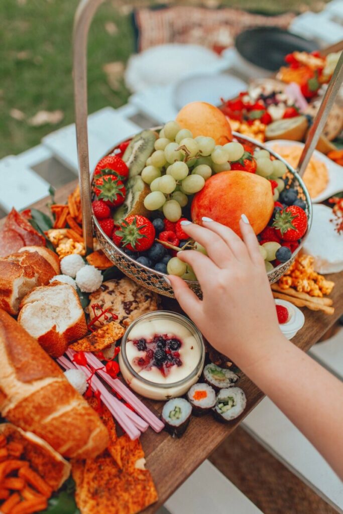 picnic feast with fruits and breads - Edited