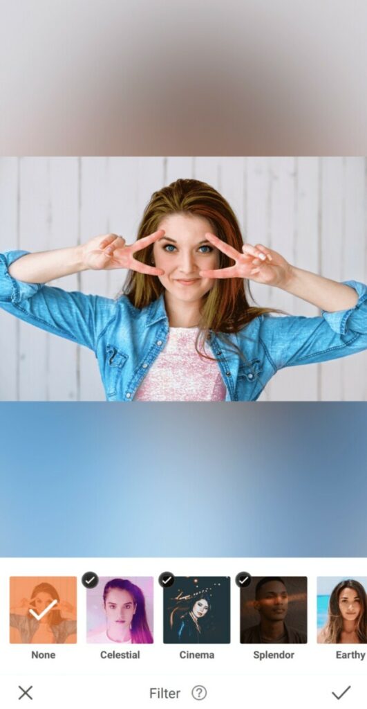 Sailor Moon edit with woman wearing chambray shirt making the peace sign over her eyes