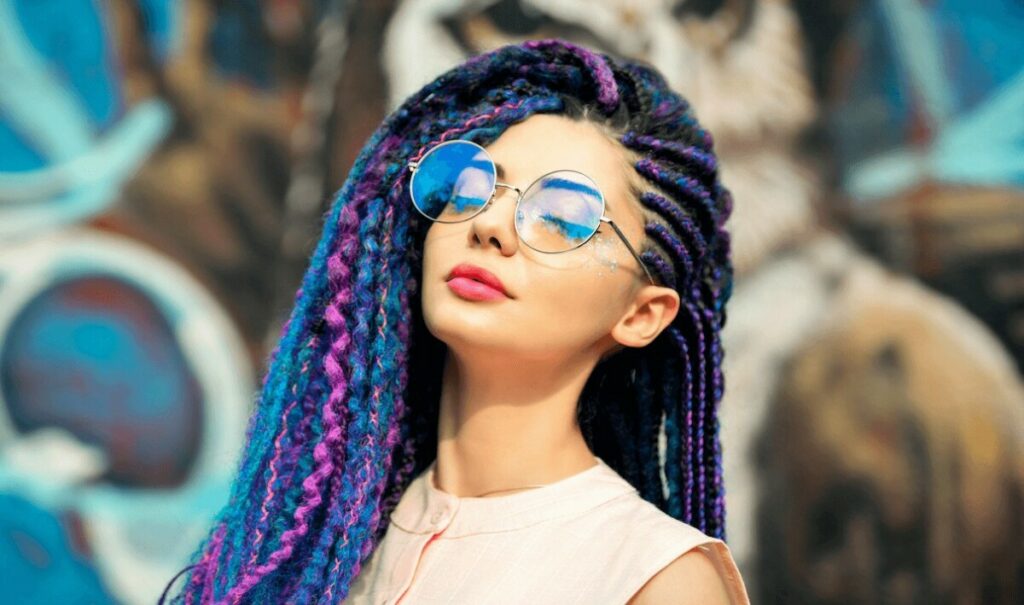 woman with colorful braids in her hair