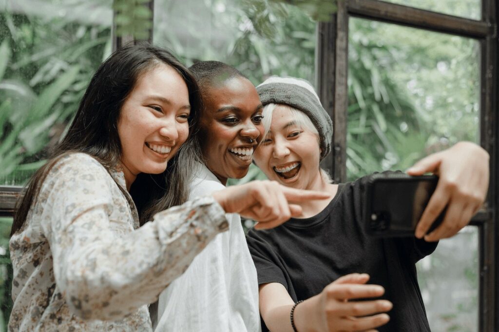 three friends take a selfie