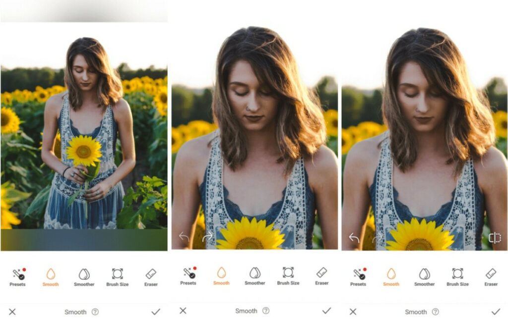 woman standing in a field holding a sunflower