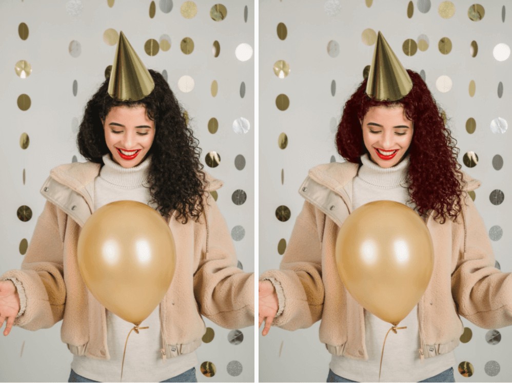 woman celebrating with a gold balloon and party hat