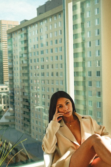 woman in cream blazer